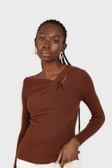 Brown cross shoulder knit top