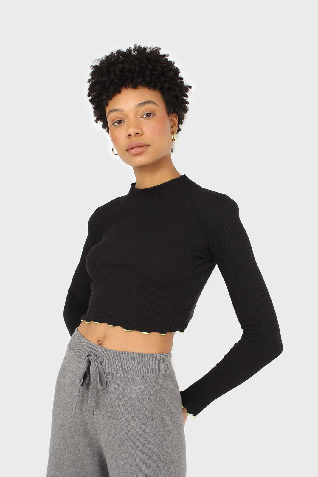 Black and neon ruffle trim cropped top