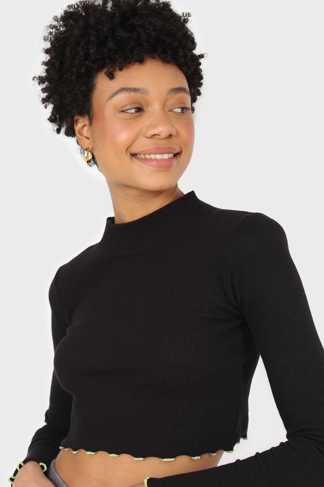 Black and neon ruffle trim cropped top