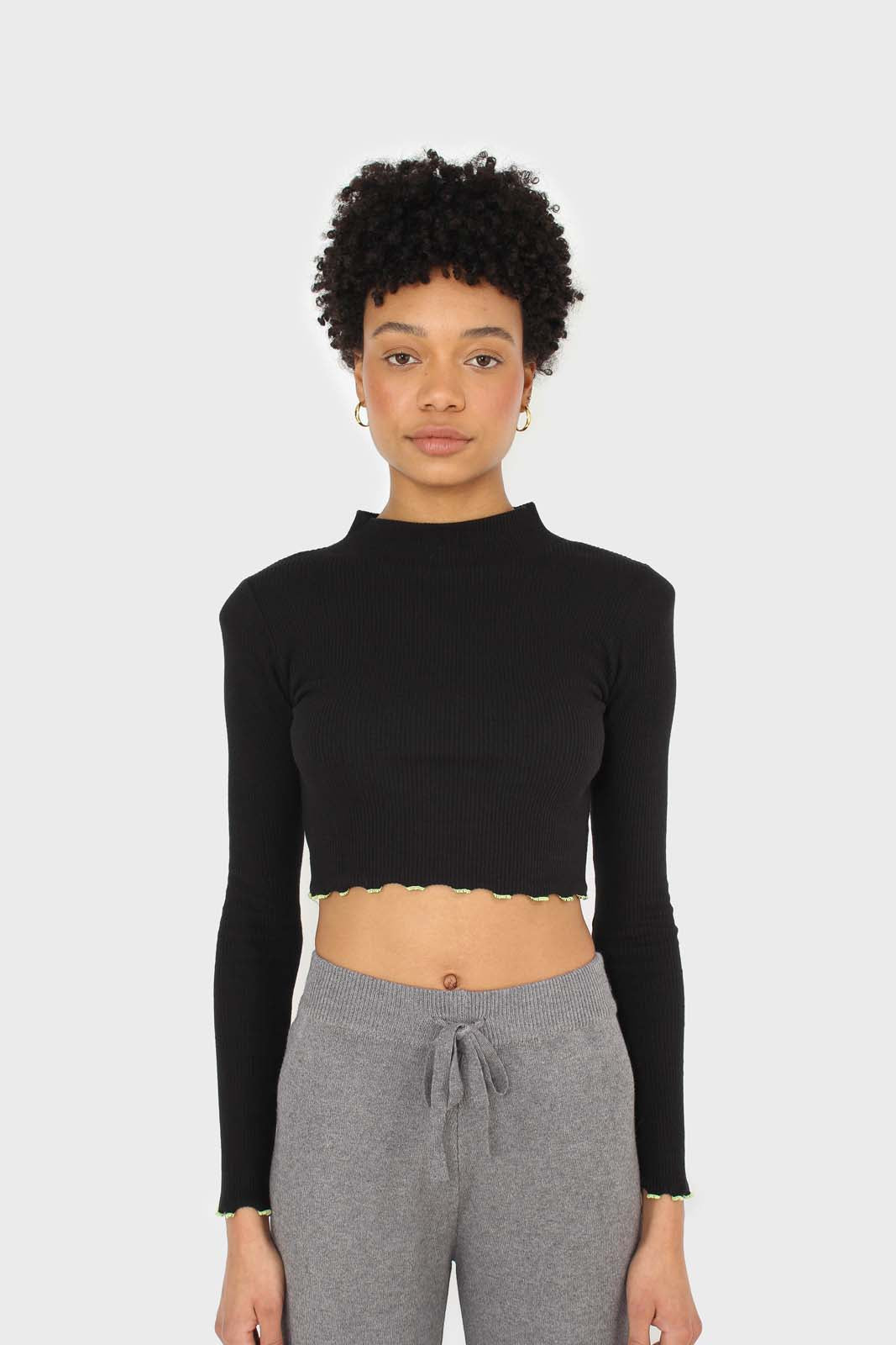Black and neon ruffle trim cropped top