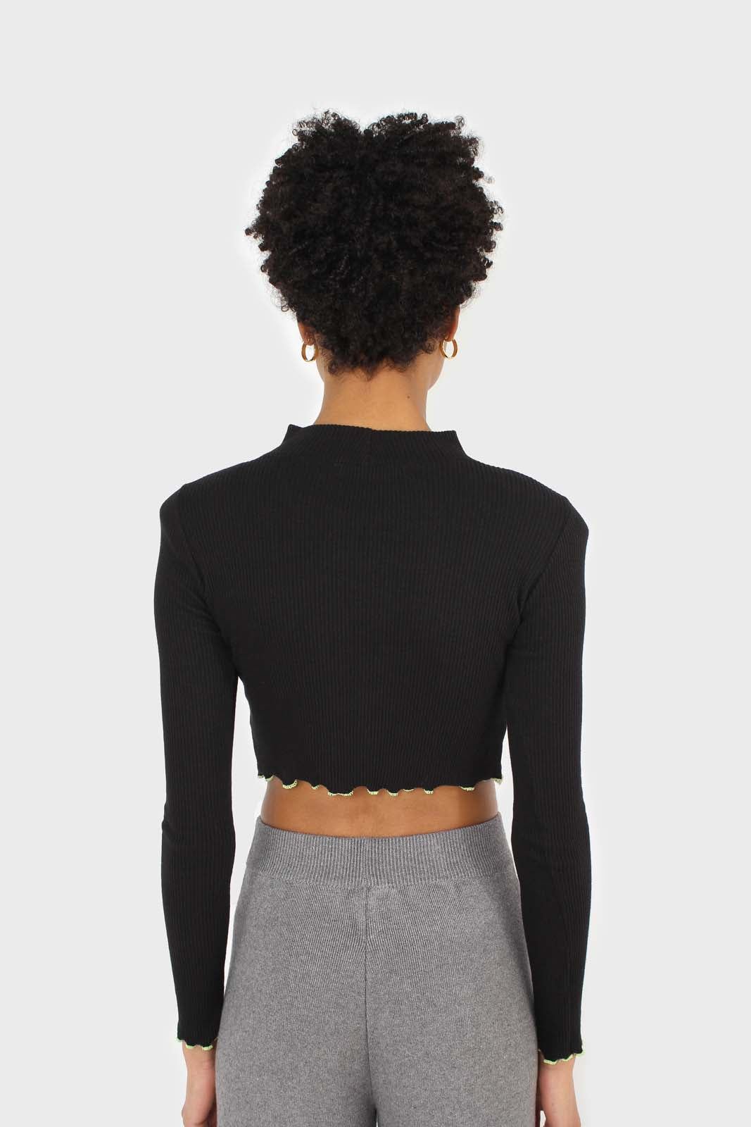 Black and neon ruffle trim cropped top