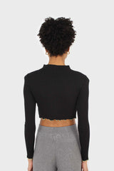 Black and neon ruffle trim cropped top