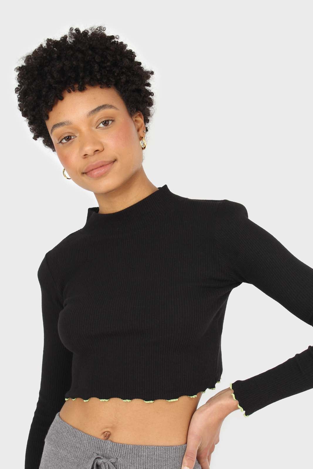 Black and neon ruffle trim cropped top