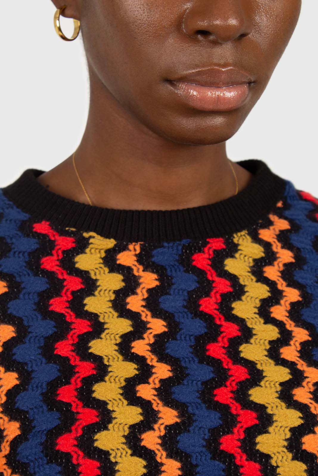 Bold red orange and blue zig-zag jumper