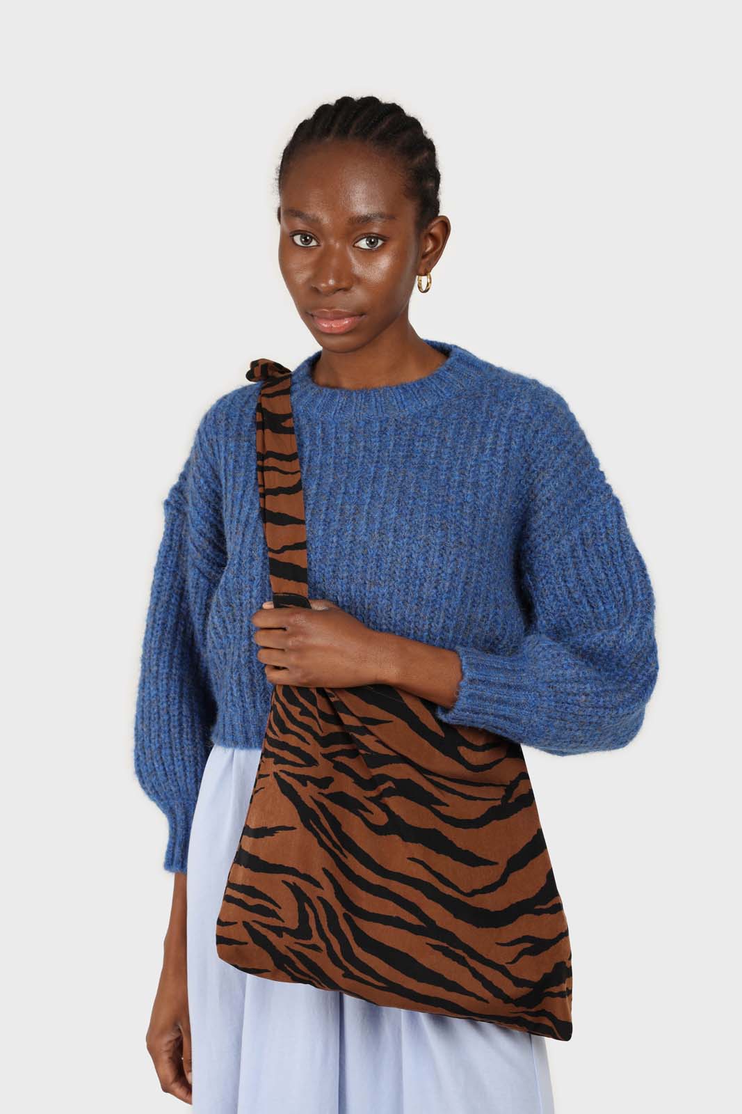 Brown and black zebra print tie strap tote