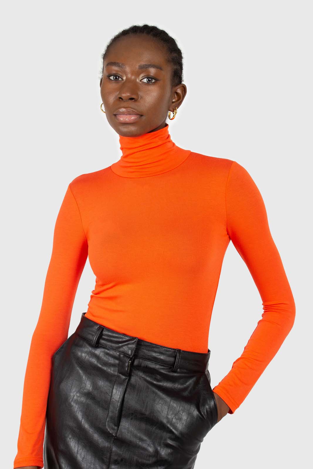 Bright orange soft jersey turtleneck top