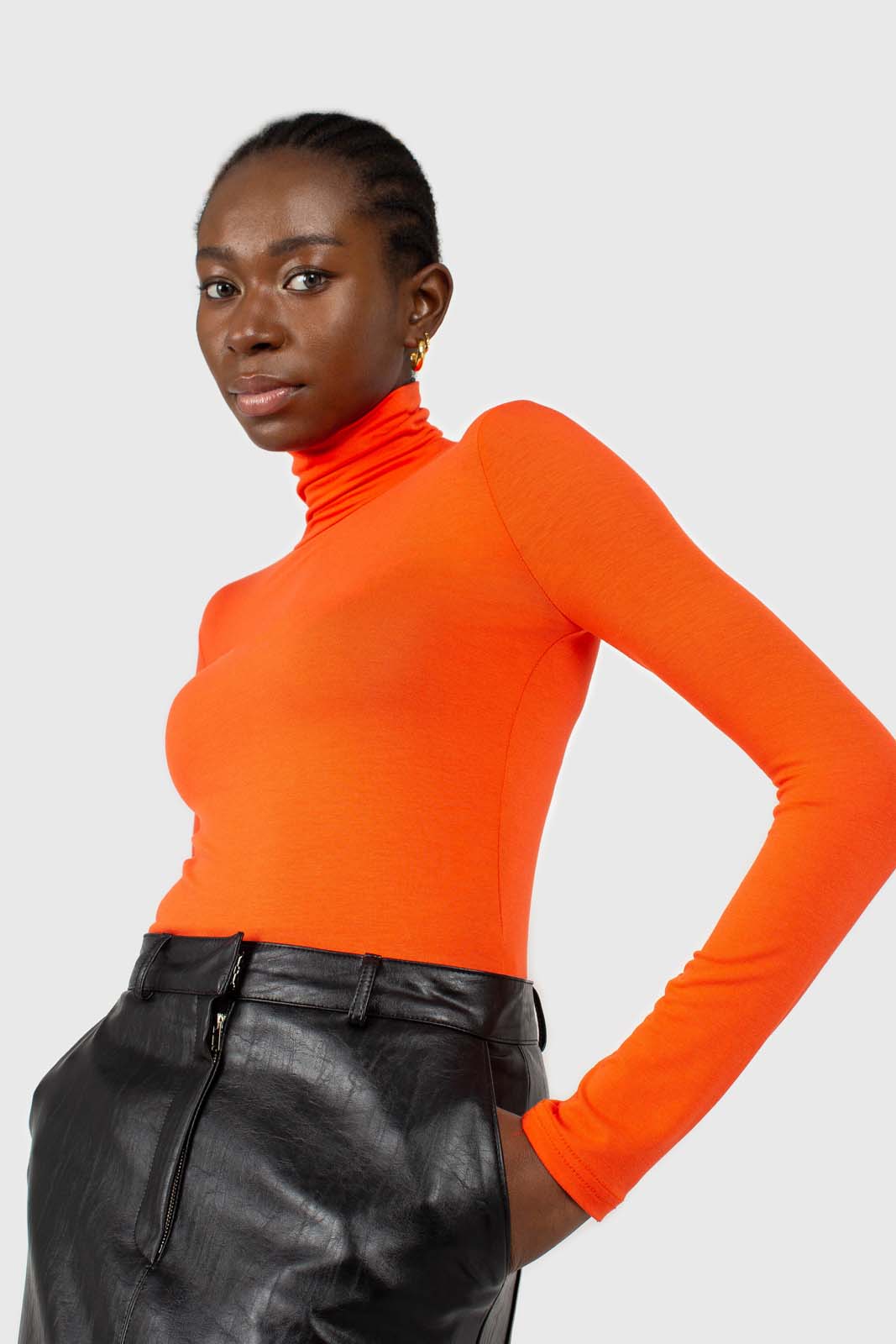 Bright orange soft jersey turtleneck top