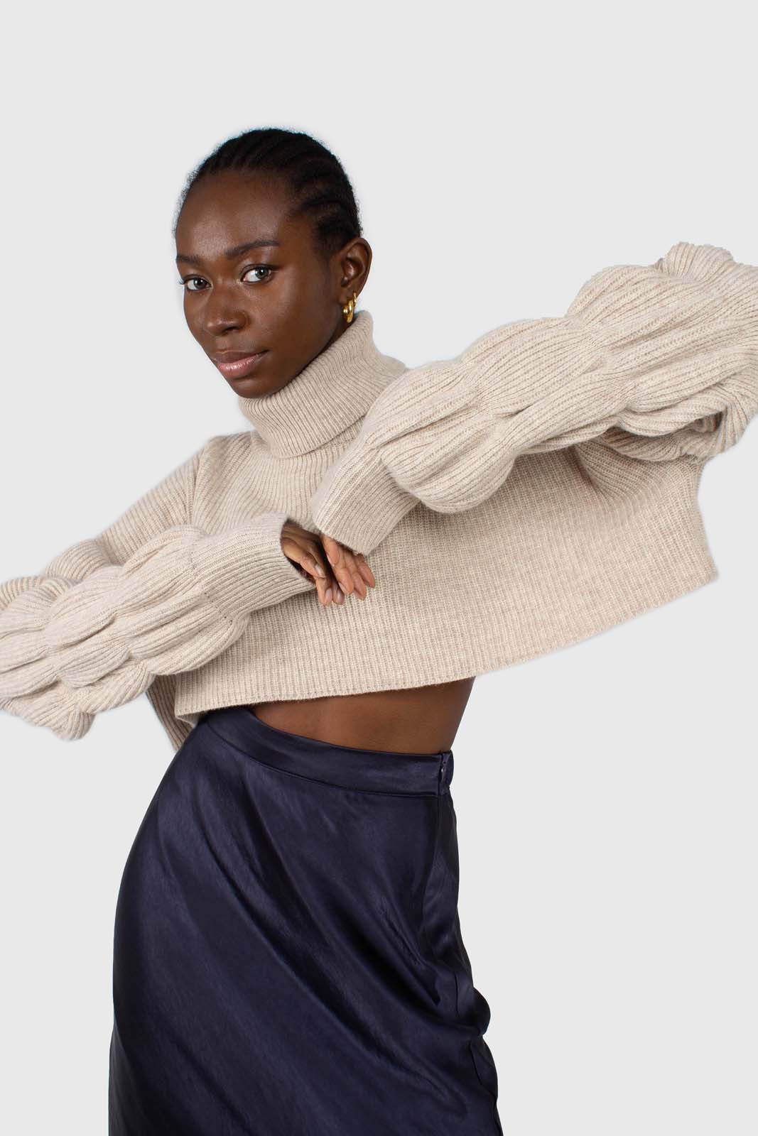Beige balloon sleeved cropped wool blend turtleneck top