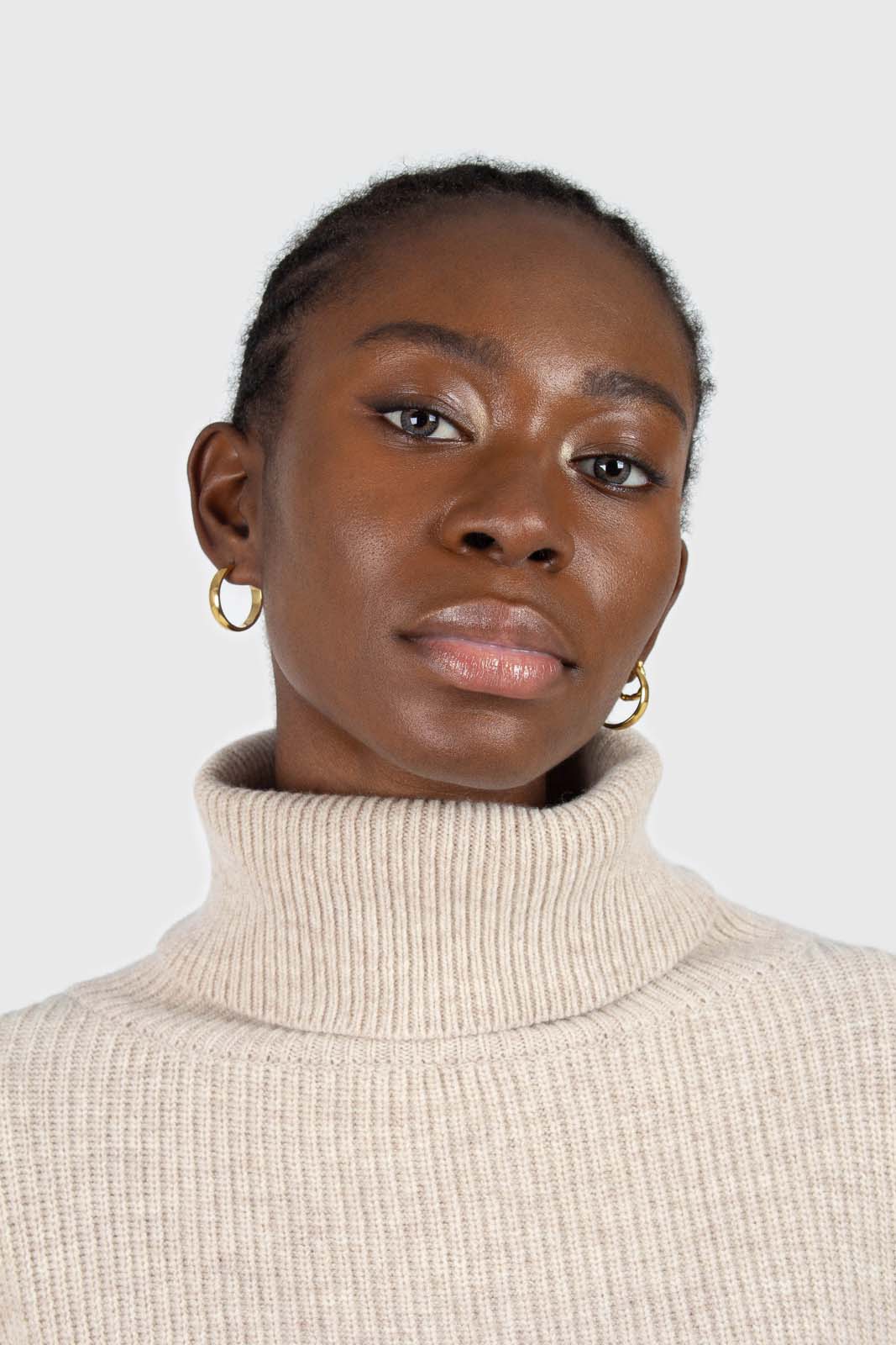 Beige balloon sleeved cropped wool blend turtleneck top