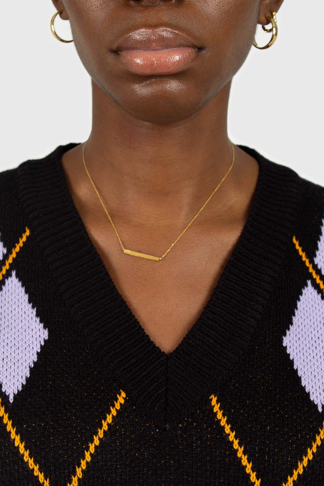 Black and lilac argyle sweater vest