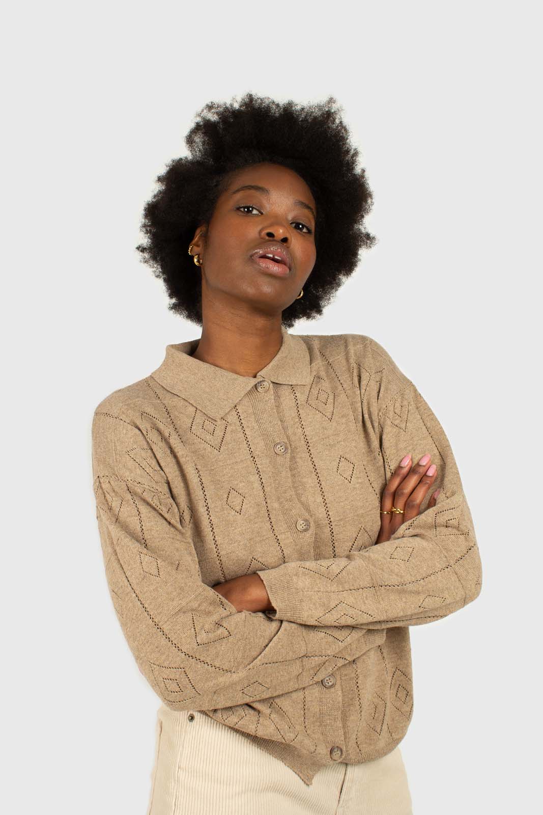 Beige patterned wool-blend knit polo top