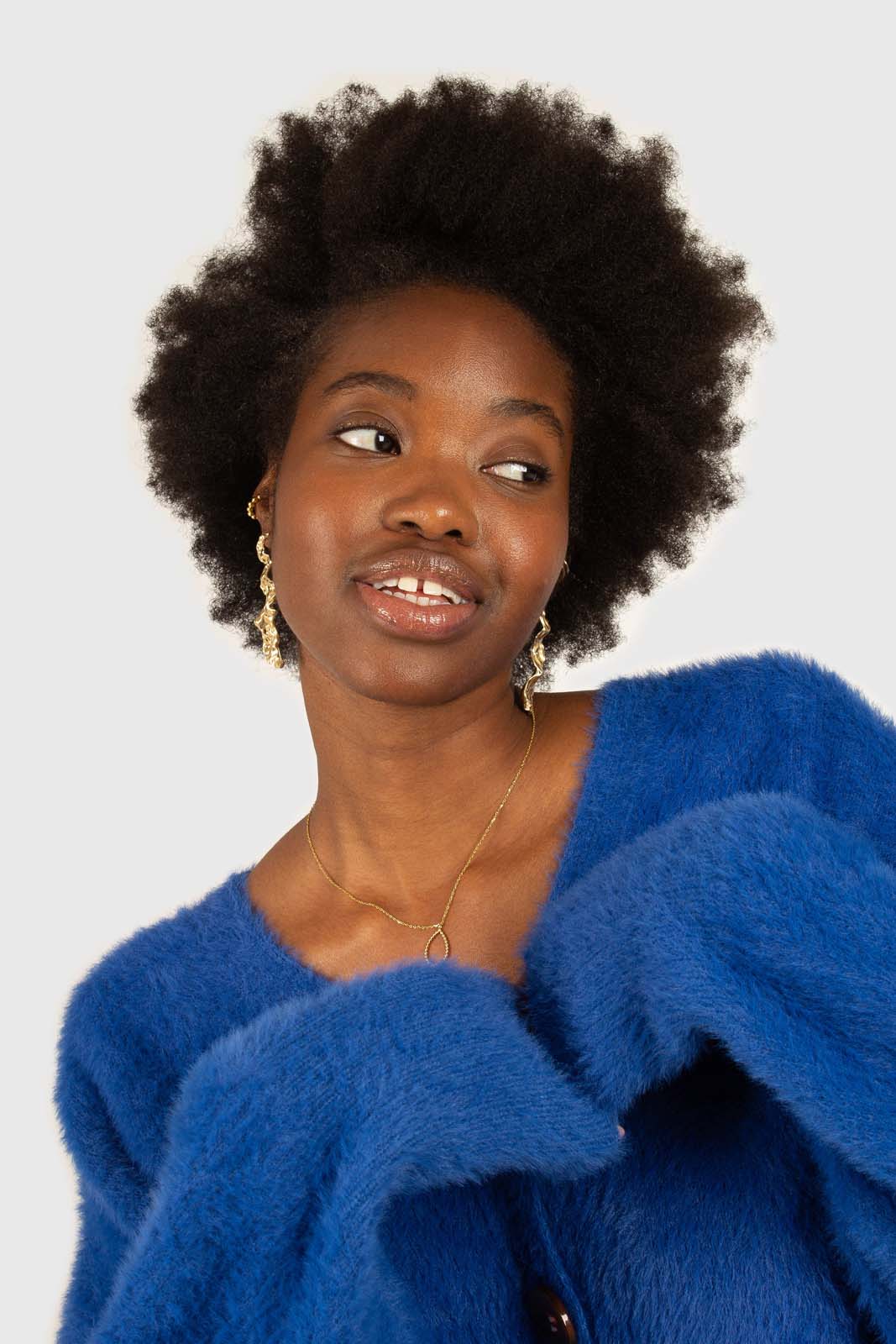 Bright blue fuzzy tortoise shell button cardigan