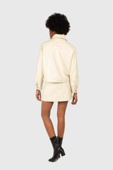 Ivory vegan leather mini skirt