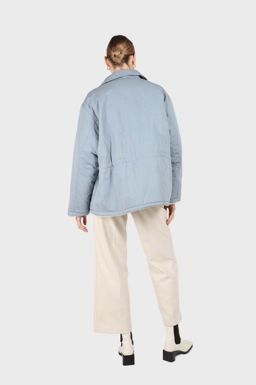 Blue teddy lined cinch back parka
