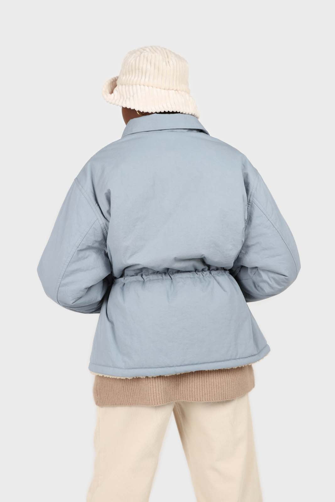 Blue teddy lined cinch back parka