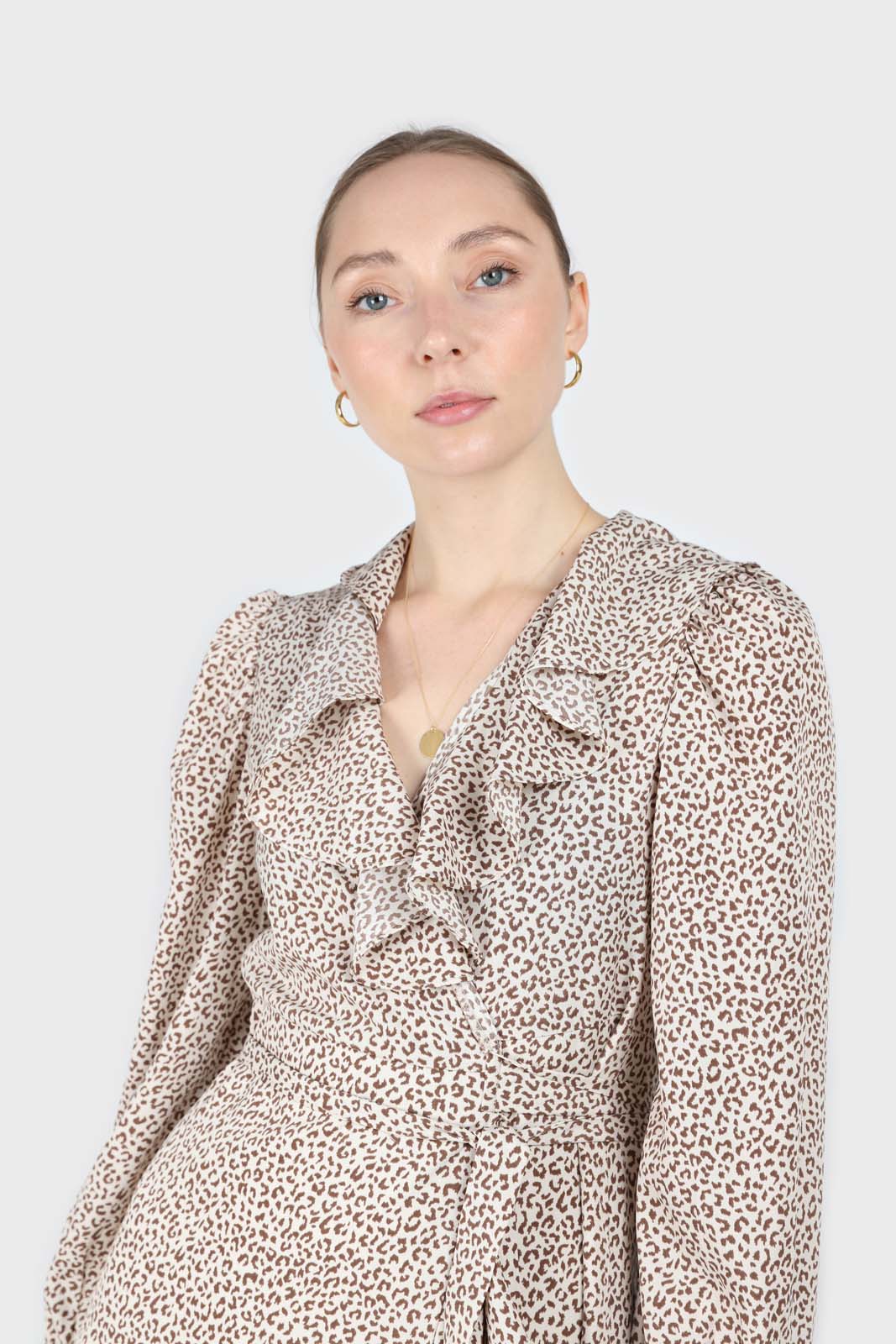 Ivory and brown animal print ruffle trim wrap dress