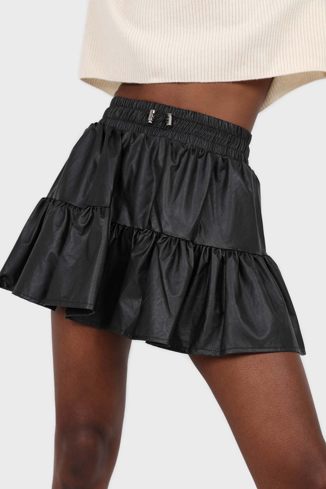 Black shiny vegan leather tiered mini skirt