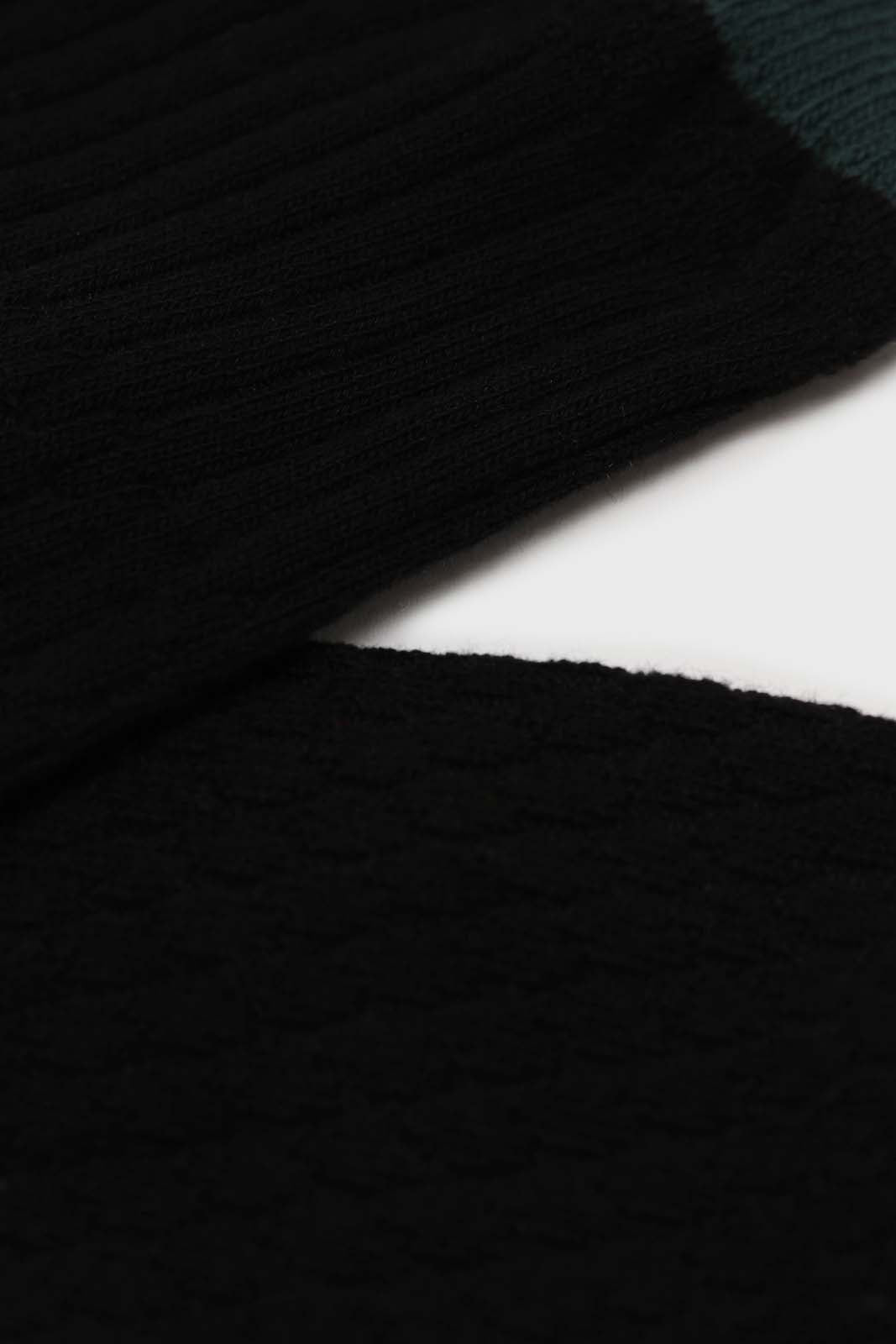 Black textured diamond green trim socks
