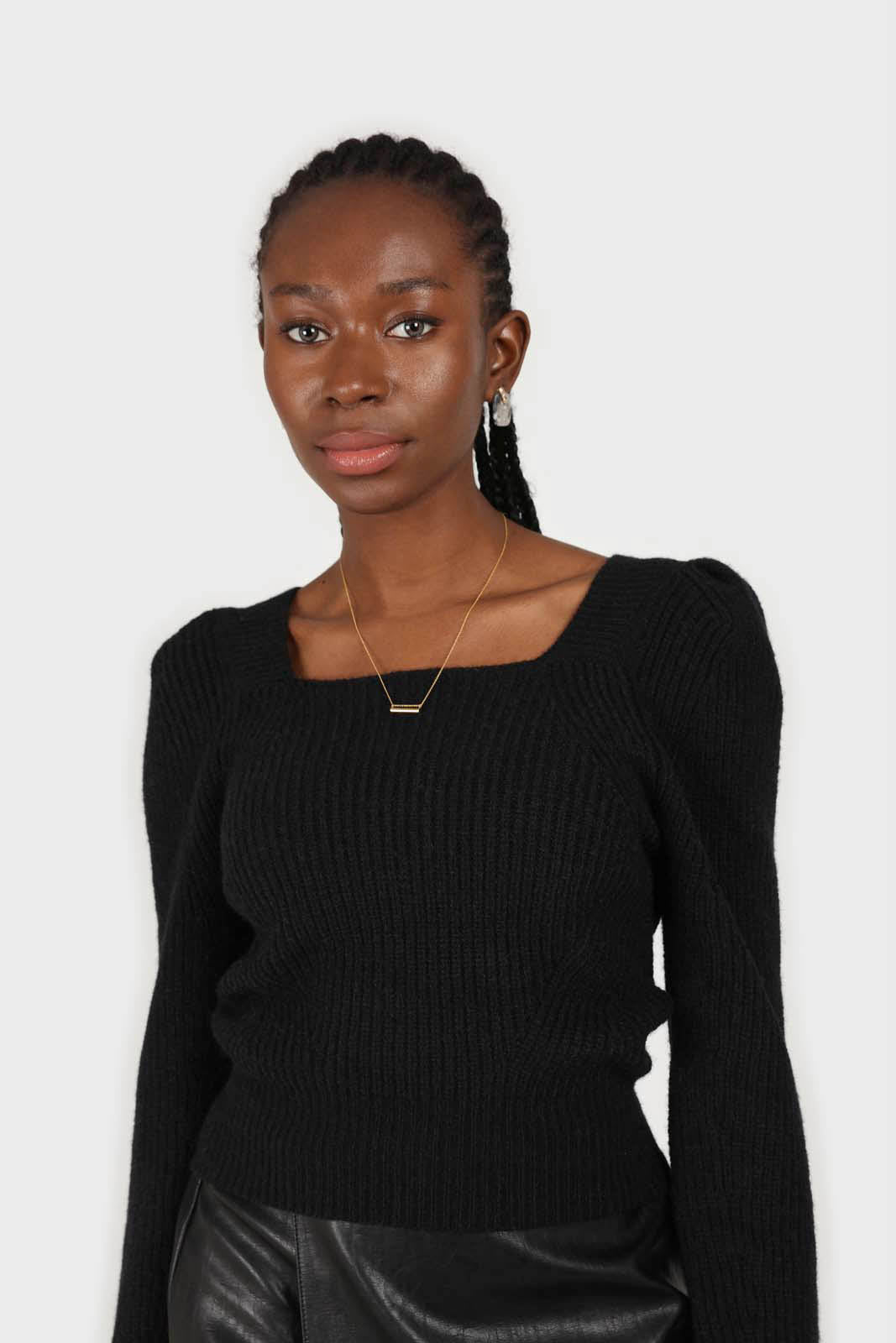 Black puff sleeved square neck knit top