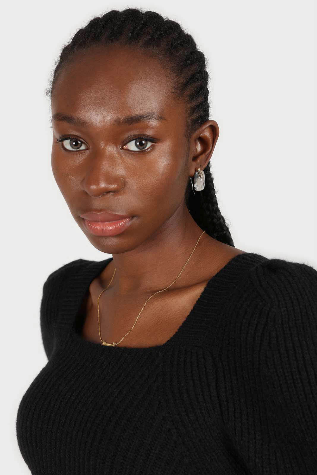Black puff sleeved square neck knit top