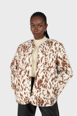 Ivory and brown animal print quilted puffer coat