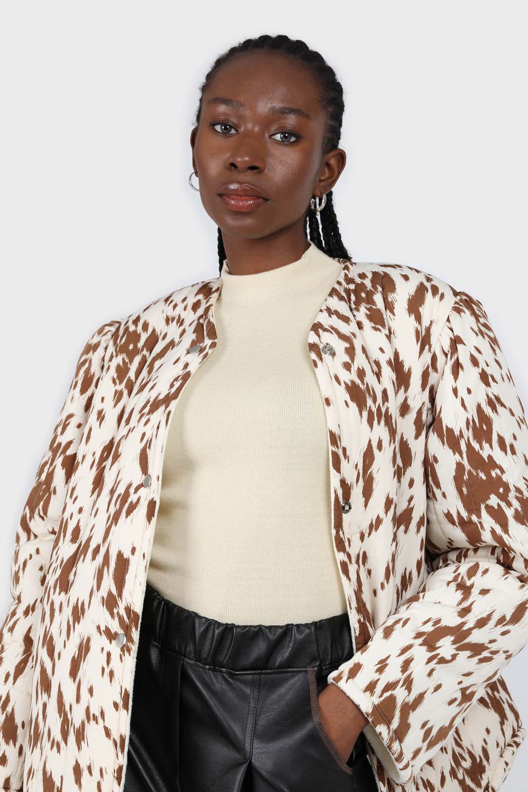 Ivory and brown animal print quilted puffer coat