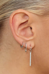 Silver rainbow pave huggie earrings - 6.5mm