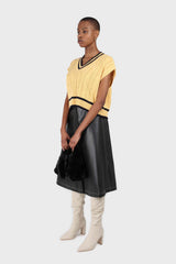 Yellow and black varsity trim cableknit vest
