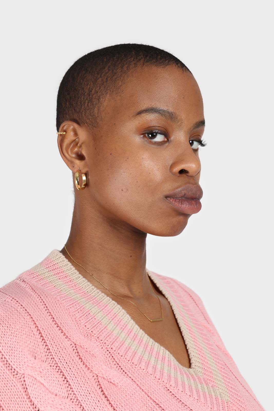 Pink and beige varsity trim cableknit vest