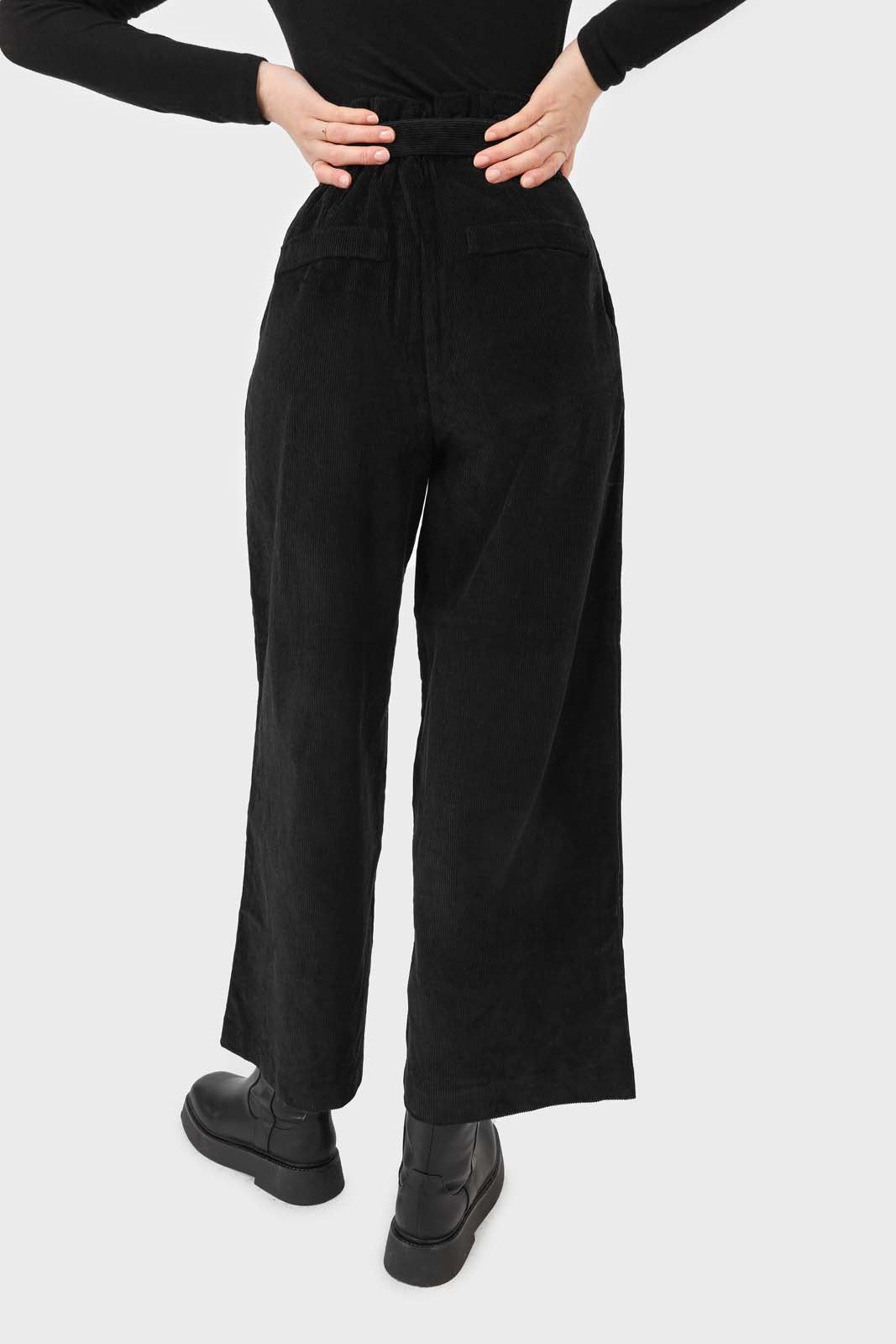 Black micro corduroy belted loose fit trousers