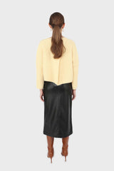 Pale yellow cross back crop front jumper