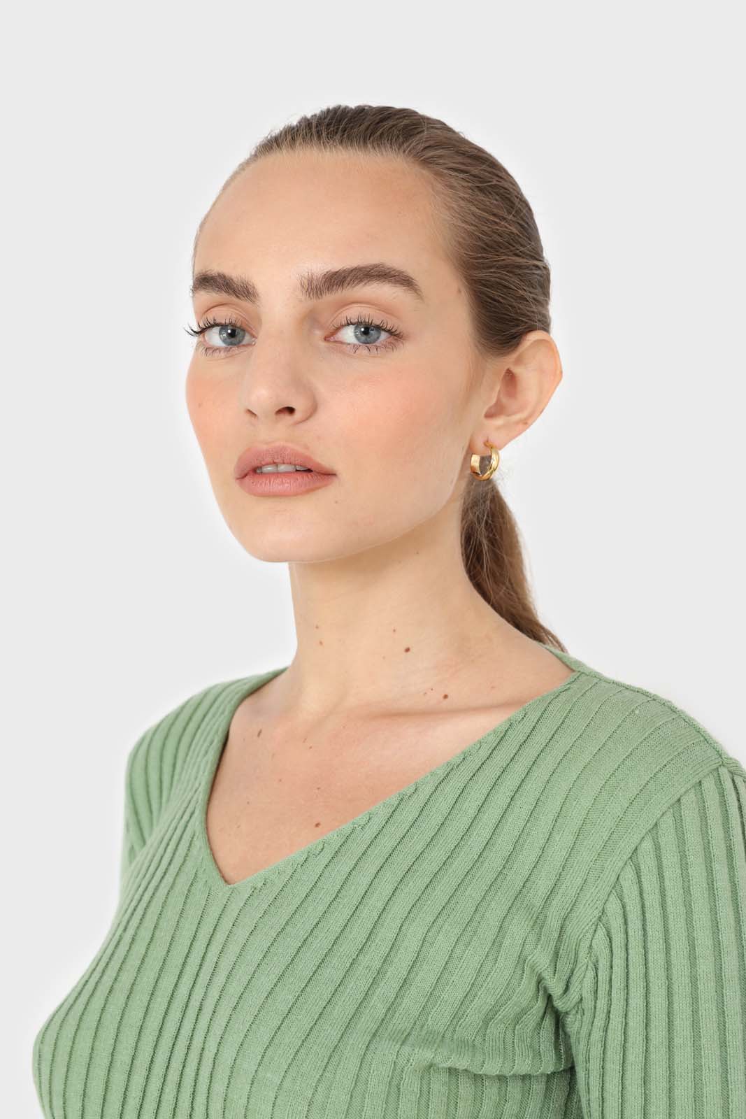Mint green ribbed V-neck fitted knit top