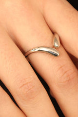 Silver colliding tear drops ring