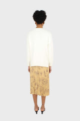 Pale yellow floral print pleated satin skirt