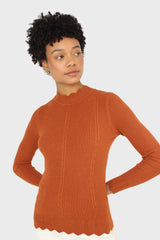 Burnt orange scalloped mock neck knit top