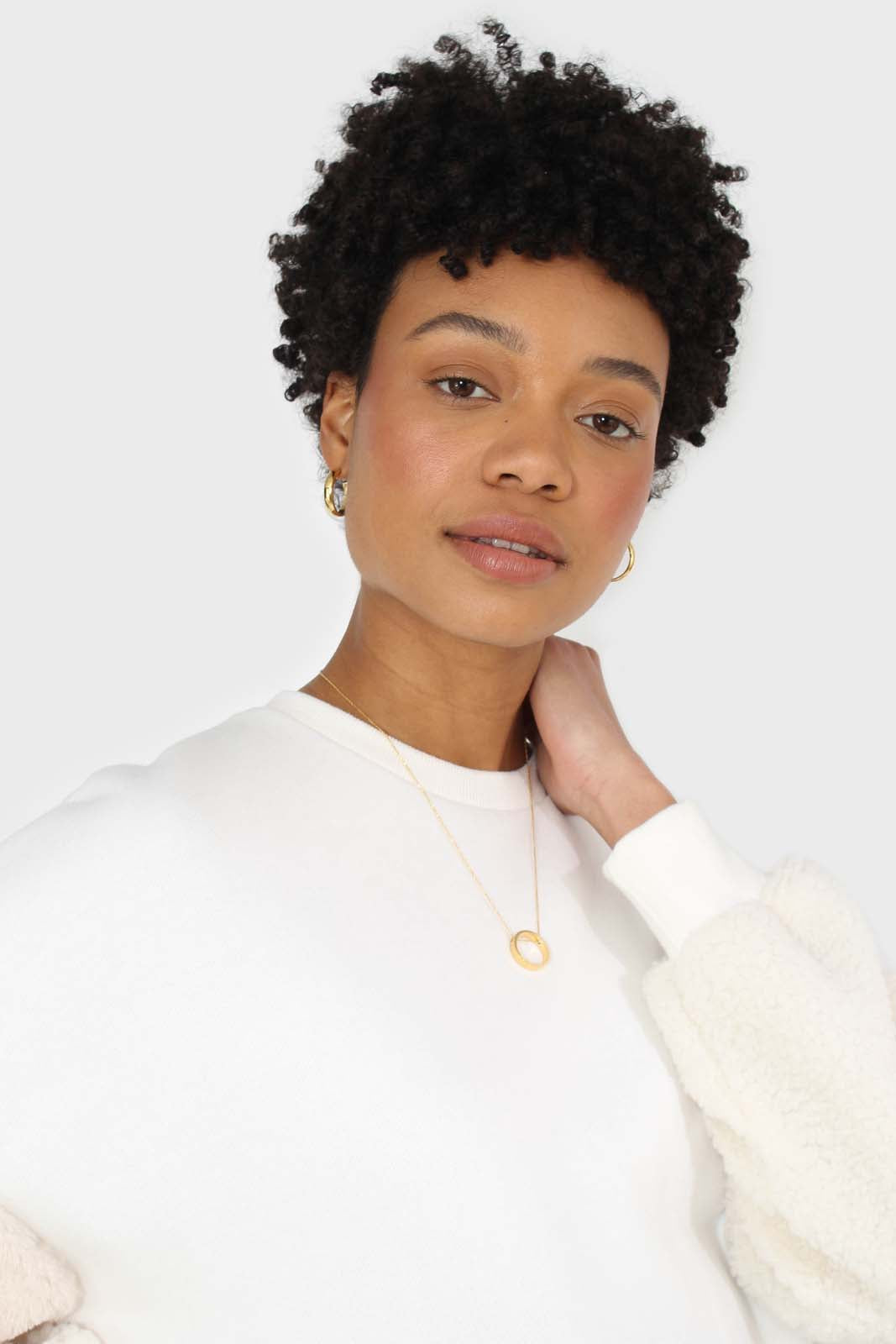 Ivory and beige faux fur sleeved sweatshirt