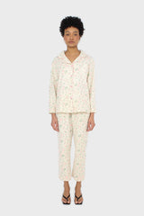 Ivory and pink floral pajama top and trousers set