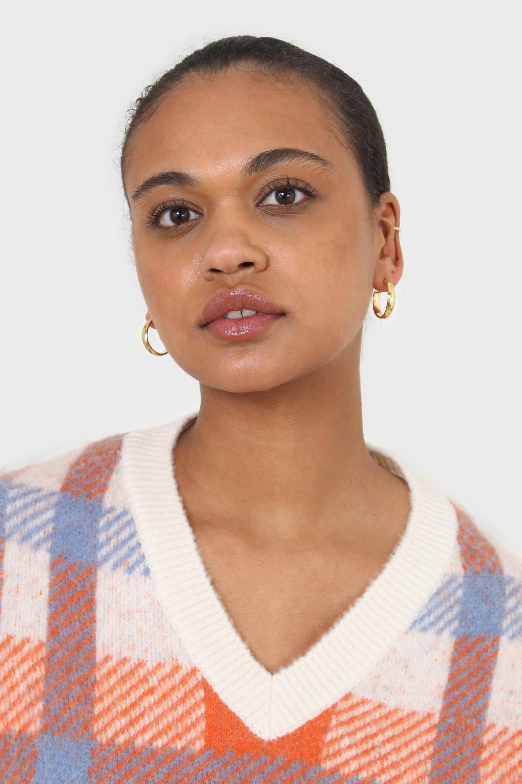 Ivory blue and orange brushed plaid sweater vest