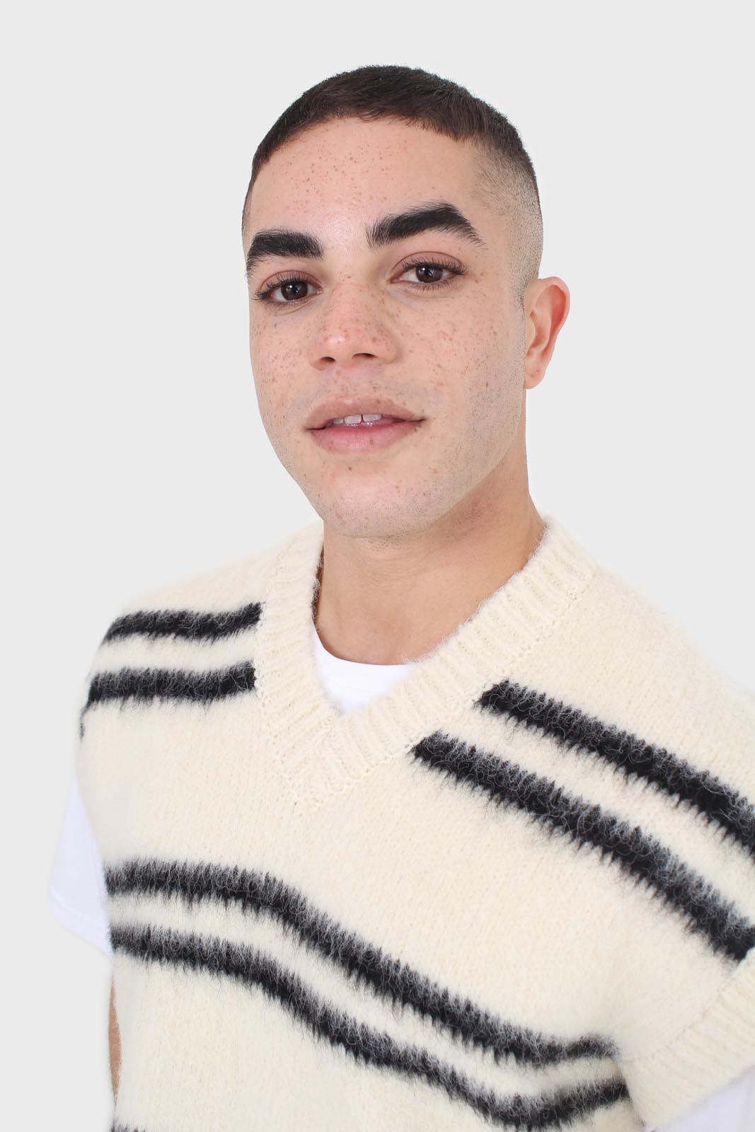 Ivory and black striped wool blend sweater vest
