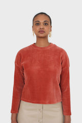 Orange ribbed velvet long sleeved top