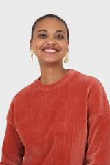 Orange ribbed velvet long sleeved top