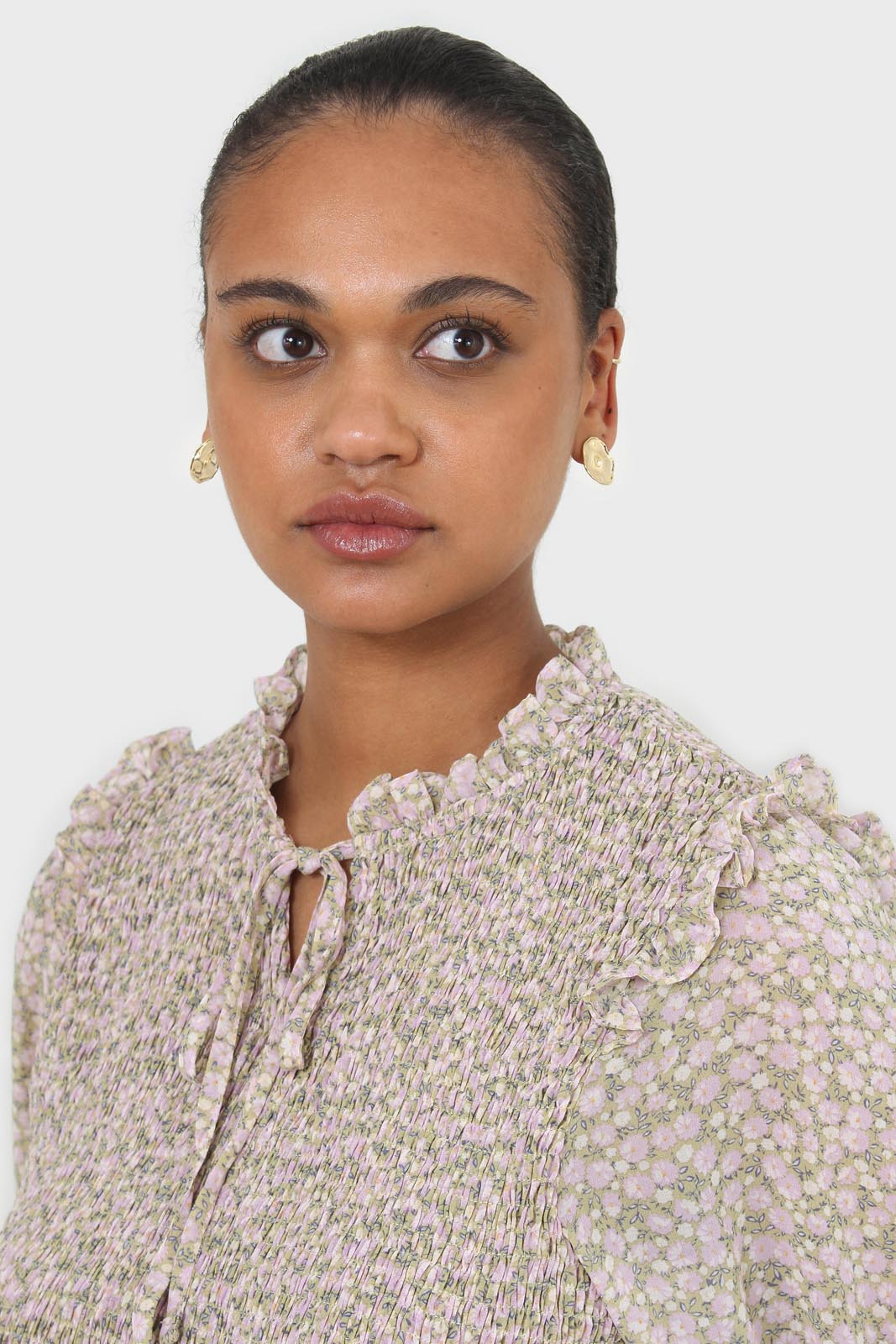 Green and lilac floral print smocked blouse