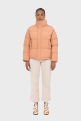 Pale orange puffer jacket