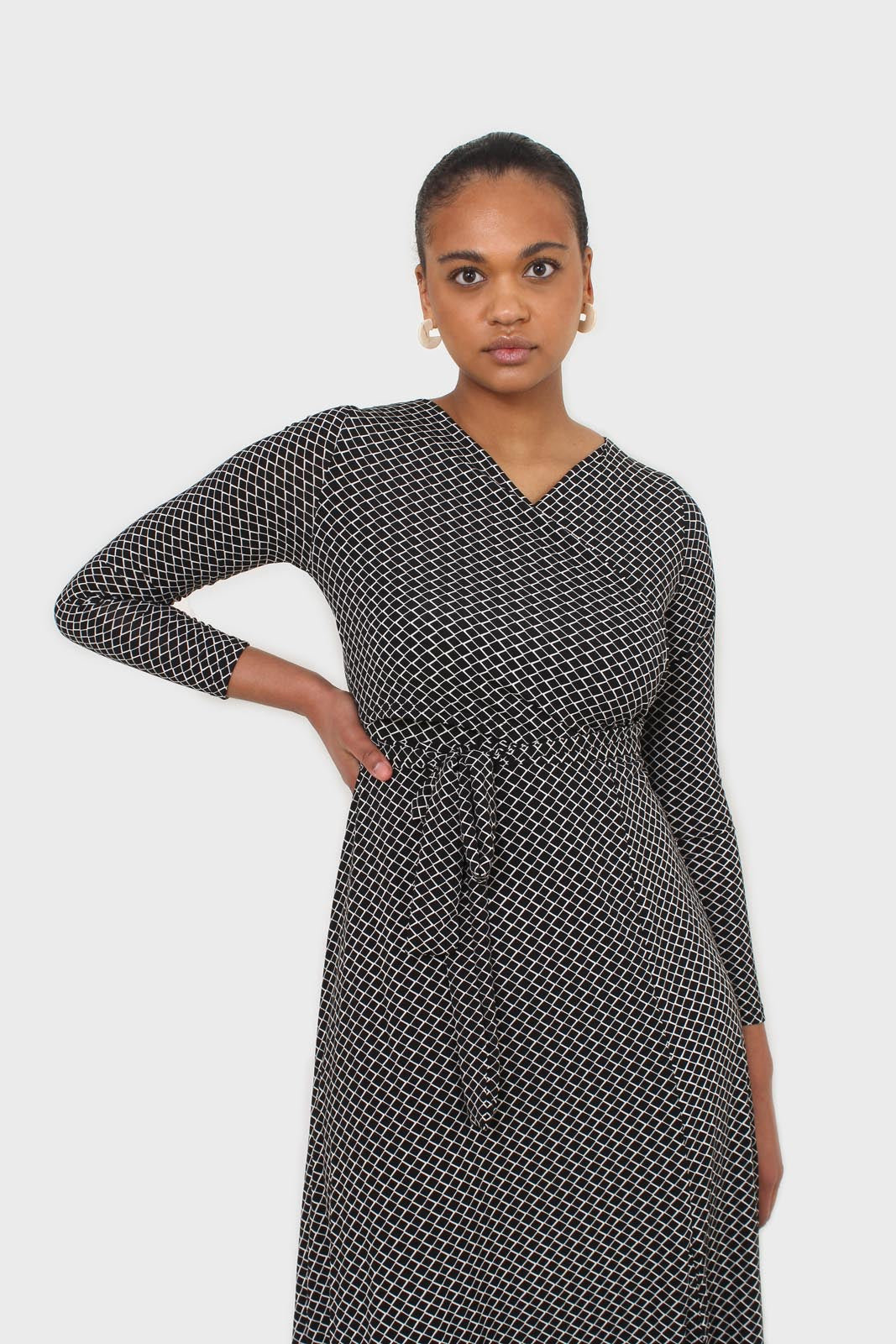 Black and white diamond jersey wrap dress