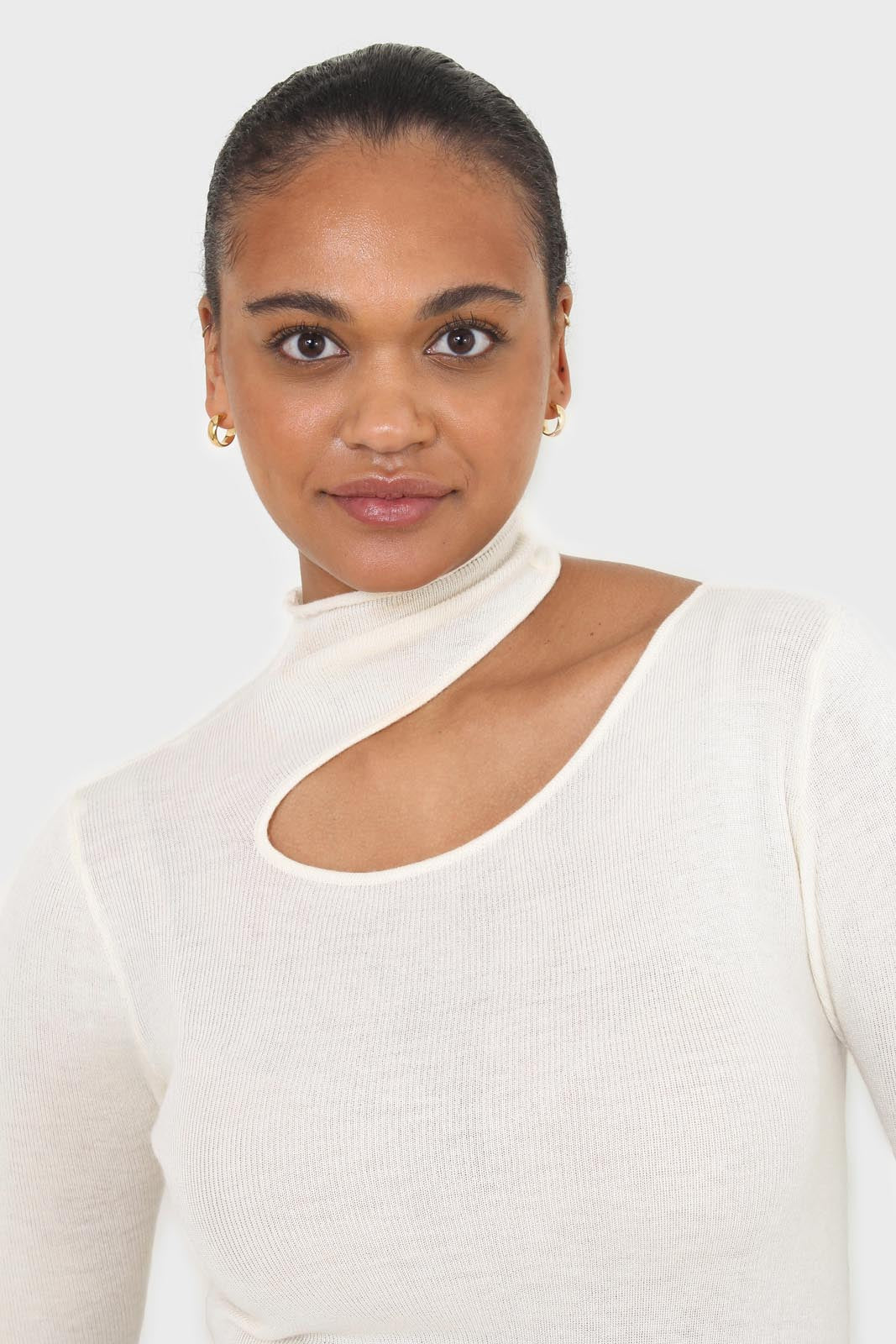 Ivory large cut out fitted knit turtleneck