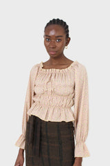 Yellow floral smocked crop blouse