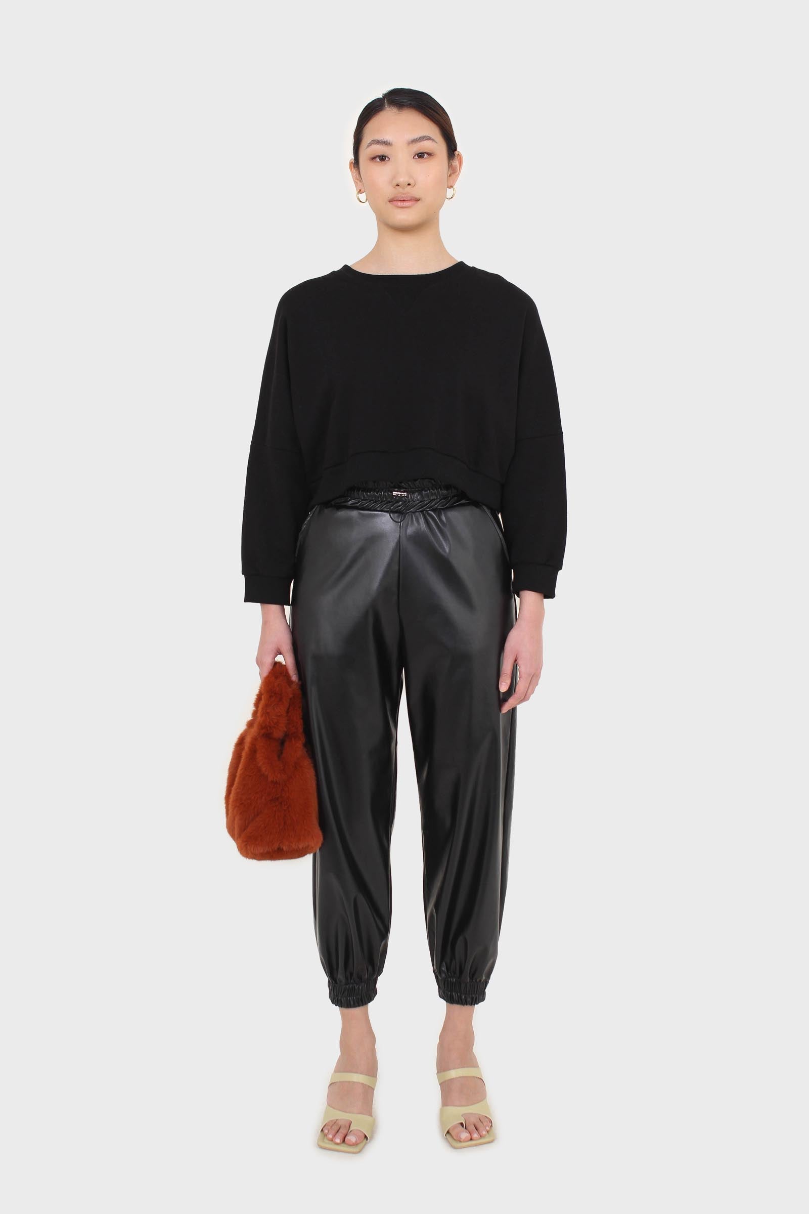 Black vegan leather jogging trousers