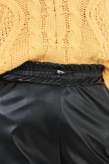 Black vegan leather jogging trousers