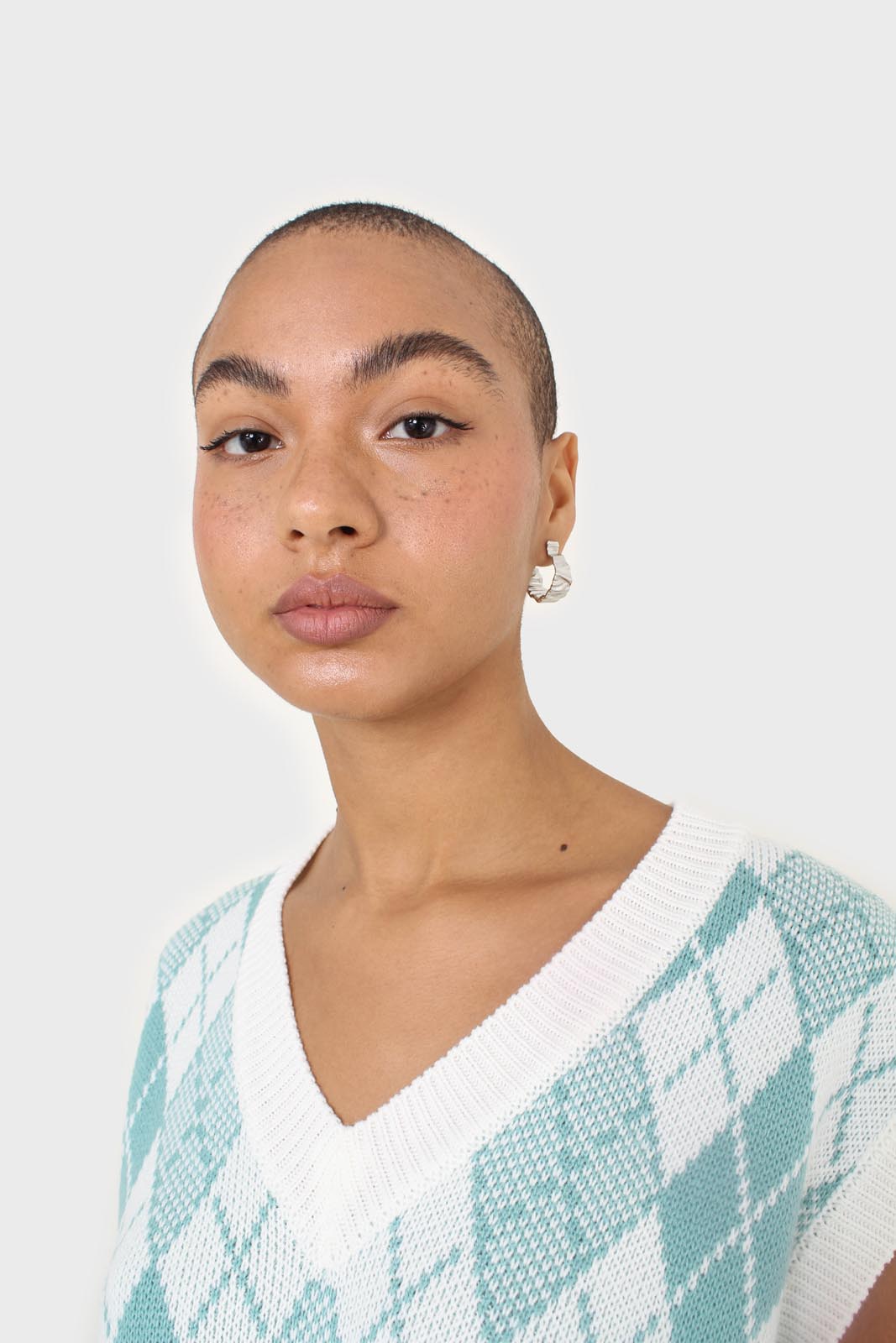 Ivory and blue argyle knit vest