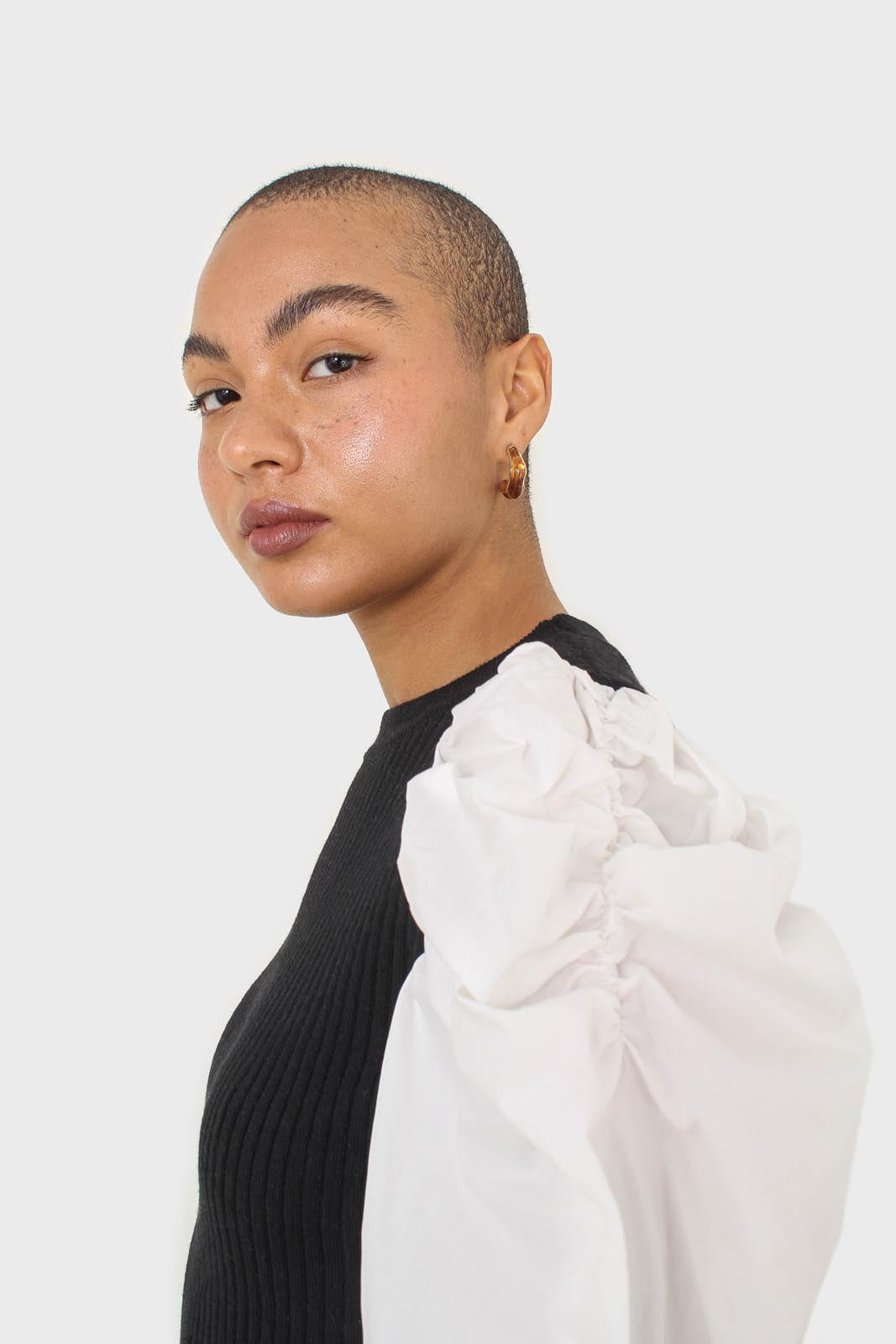 Black knit and white contrast puff sleeved top